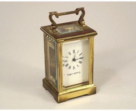 CARRIAGE CLOCK.
A Mappin & Webb Ltd. miniature brass cased carriage clock. Height 8.5cm.