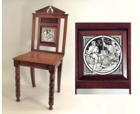 HALL CHAIR.
A Victorian mahogany hall chair, the back set a Moyr Smith tile 'Harold's Path to William.' Height 98cm.
PLEASE N
