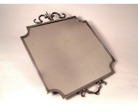 MIRROR.
A 1920's Swedish pewter wall mirror, mounted with a stylised reindeer's head, by Edvin Ollers, stamped to side frame.