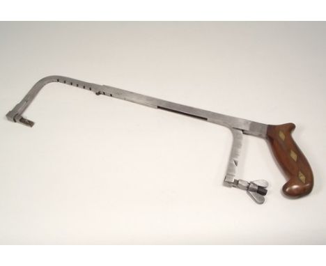 STEEL HACKSAW.
A good quality mahogany, brass & steel adjustable hacksaw.
