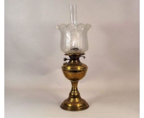 OIL LAMP.
A brass oil lamp, with etched shade. Height 56cm.
PLEASE NOTE:  Our in-house, postal shipping service is NOT availa