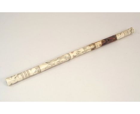 CHINESE OPIUM PIPE.
A Chinese decorated bone opium pipe, incomplete. Length 49cm.