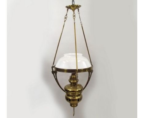 OIL LAMP.
A brass hanging oil lamp with pierced supports. Drop 89cm.
PLEASE NOTE:  Our in-house, postal shipping service is N