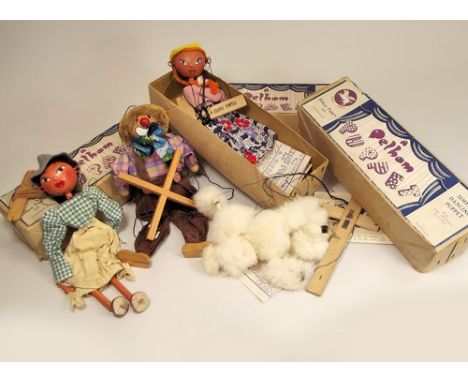 PELHAM PUPPETS ETC.
Three boxed Pelham Puppets including a fur poodle, & one other string puppet.