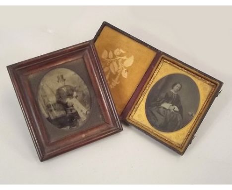 AMBROTYPES.
A 19th century ambrotype of a Victorian lady, 8.5 x 7cm. Moulded leather case & a framed 19th century ambrotype p