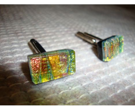 Pair of cufflinks understood to be handmade in glass