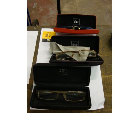 3 assorted pairs of Alain Mikli glasses each including a case, in one instance with a very light blue tint to the prescriptio