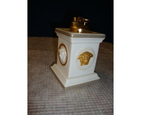 Versace by Rosenthal Gorgona table lighter, in white with gold detailing, with a removable lighter section which we understan