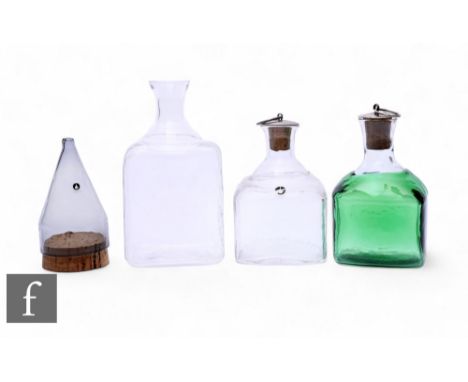 Goran Warff for Pukeberg, three mid 20th Century Scandinavian flasks, including green over clear glass example, of square for