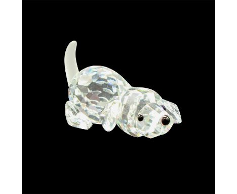 Crouched in play, with frosted tail up, has faceted body with black button eyes and nose. Swarovski backstamp. 7619 000 004. 