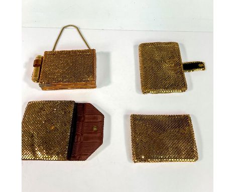 Includes a bifold, 2 snap bifold wallets, and a wallet with make-up kit. A tiny comb, mirror, and lipstick holder with bead o