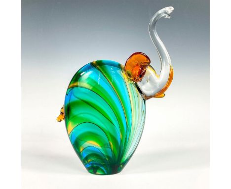 Stunning, large blown glass elephant with raised trunk in beautiful coloration. Artist signature etched to side. Oggetti fact