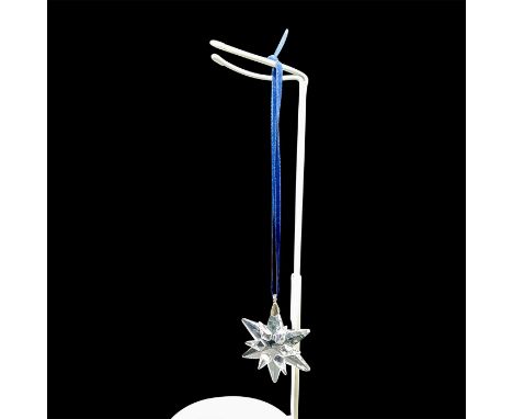 Part of the Ornaments collection. Lead crystal mini star designed with 6 star-spikes attached to a small centre piece . Minia