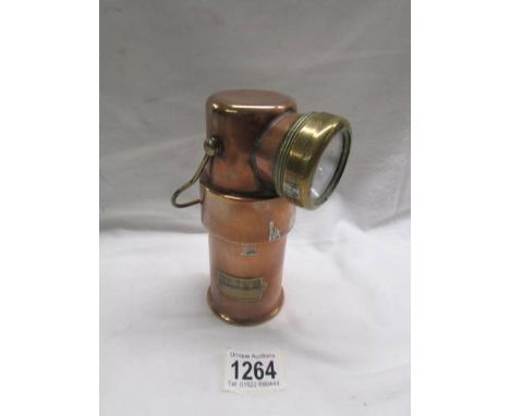 A copper lamp marked CEAG Ltd., Barnsley, Yorks.