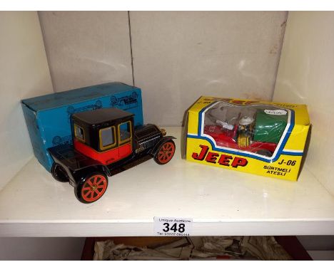A boxed tin plate vintage style car &amp; fire engine jeep