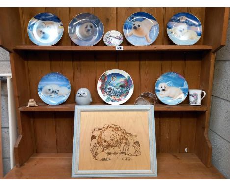 A collection of seal related items including 6 x Franklin mint limited edition porcelain plates, titles including, What's up 