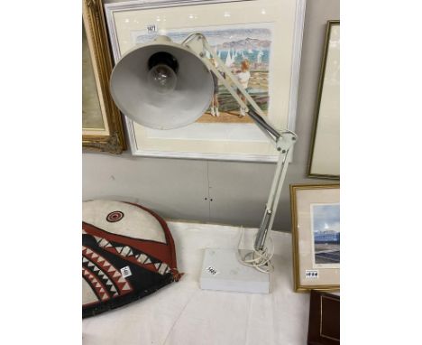An angle poisse lamp.