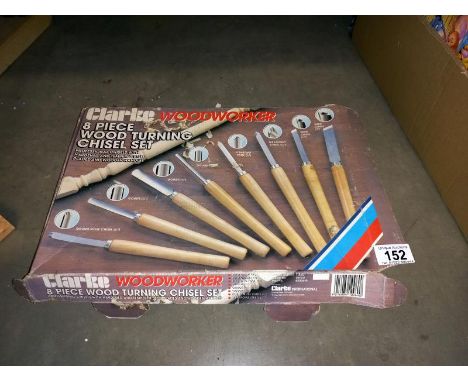 A boxed Clarke 8 piece wood turning chisel set