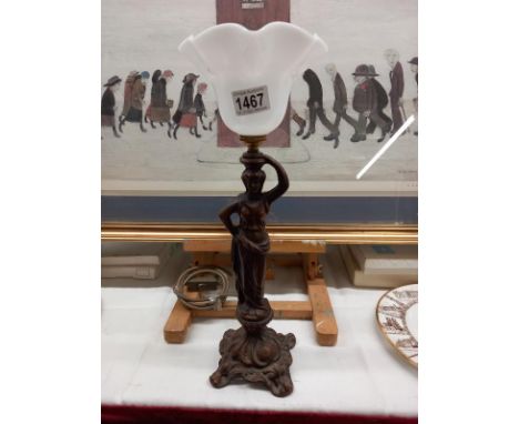 A Spelter figure table lamp.