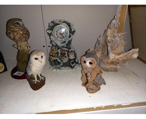 An owl clock and 4 owl figures