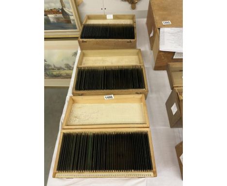 A collection of c. 150 glass negatives in 3 wooden boxes, taken during the Edwardian period and the1920s. The majority of the