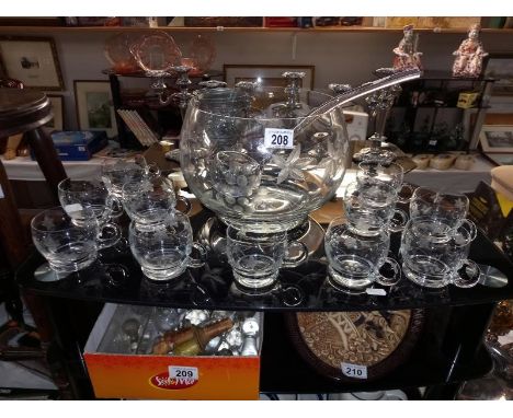 A punch bowl, ladle &amp; 11 glasses/cups. Collect Only.