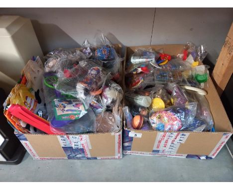 A large lot of McDonalds toys some still in bags, may have some complete lots includes Furby's, Action Man, Dalmatians, etc p