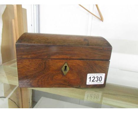 A Victorian oak tea caddy.
