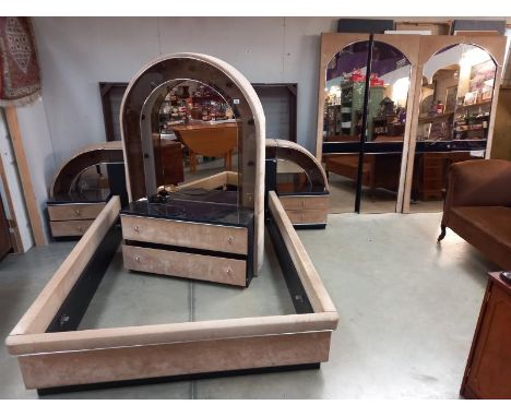 A 1970's bedroom suite including 4'6" bed with integral lighting and Novex music system. Double wardrobe and dressing table.
