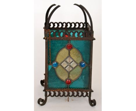 An early 20th Century brass framed hall lantern with coloured leaded light panels, height 49cm, S/D.