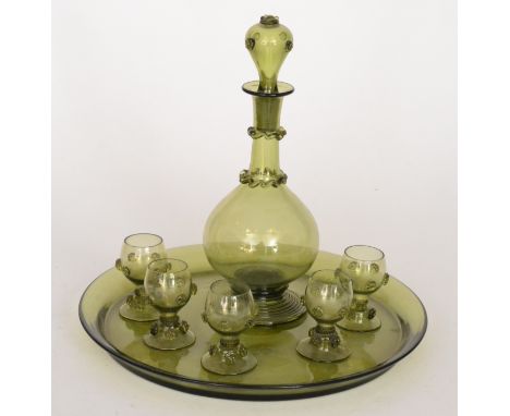 An early 20th decanter tray set in the manner of James Powell & Sons, comprising a shallow circular tray with a footed globe 