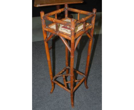 A Victorian tile inset bamboo jardiniere stand in the Aesthetic taste, height 102cm