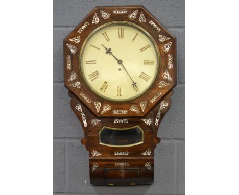 A 19th Century rosewood and mother of pearl inlaid octagonal wall clock, paned dial over a pendulum enclosed by a gilt panel,