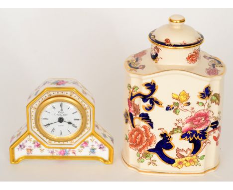 A contemporary Royal Crown Derby Royal Antoinette pattern mantel clock with transfer applied floral decoration, printed marks