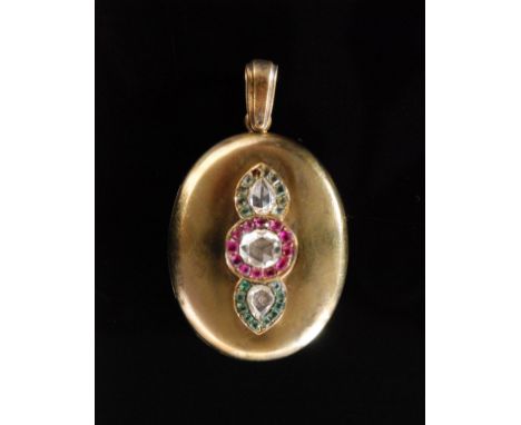 A Victorian 18ct diamond, ruby and emerald oval locket pendant, the hinged locket centred by a bow shaped motif collar set wi