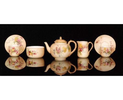 An early 20th Century Royal Worcester blush teaset comprising teapot, four teacups and saucers, milk jug and a sugar bowl, al