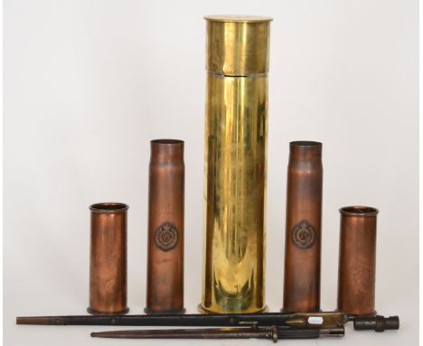 A large 1915 brass shell case and cover, a pair of copper shell cases each mounted with a badge for the Royal Engineers engra