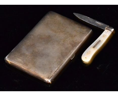 A George V hallmarked silver rectangular cigarette case of engine turned design and gilt interior, length 12.5cm x width 8cm,