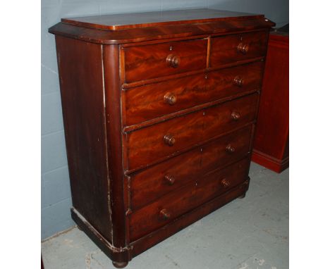 A Victorian mahogany caddy top chest of two short and four long drawers, turned wood handles on bun feet, width 123cm