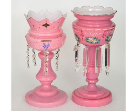 A 19th Century Continental table lustre with stepped circular foot, baluster form stem and ovoid bowl, cased in pink over opa