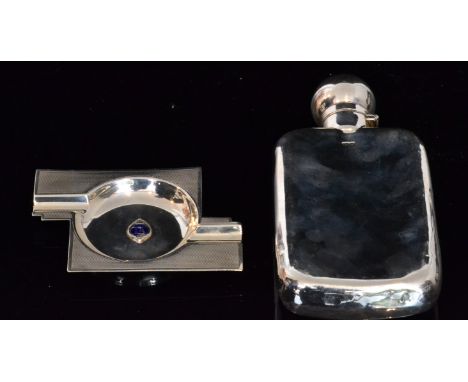 A hallmarked silver hip flask, of plain shaped rectangular form with hinged domed screw cap, length 17cm, marks rubbed, toget