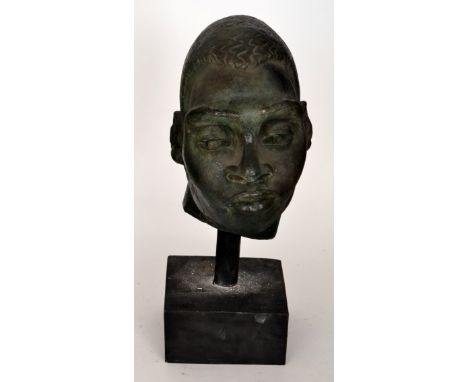 After the Antique - A 20th Century bronzed Nubian head on ebonised square plinth base, height 43cm