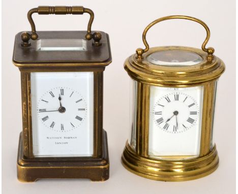 Two 20th Century miniature carriage clocks to include a Matthew Norman example, together with an unnamed clock of oval form, 
