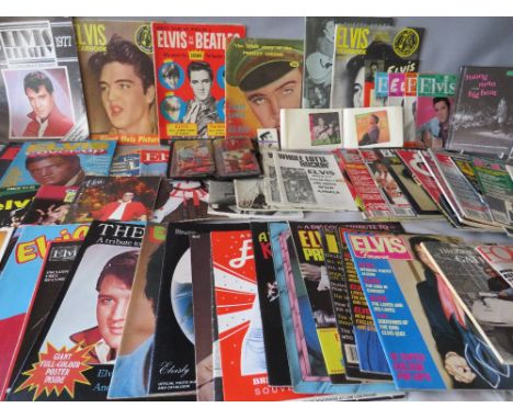 A LARGE COLLECTION OF MODERN AND VINTAGE ELVIS PRESLEY MAGAZINES, SCRAPBOOKS AND MEMORABILIA, to include vintage bubble gum c