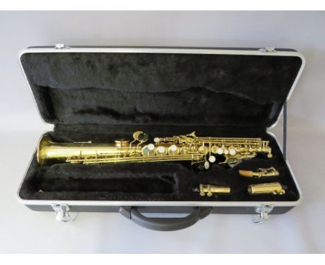 A GEAR FOR MUSIC SOPRANO SAX WITH FITTED CASE, having a lacquered brass body and mother of pearl style key pads