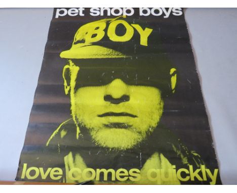 A VINTAGE PET SHOP BOYS 'BOY' POSTER, together with a selection of posters comprising The Christians, Level 42 and Frankie Go