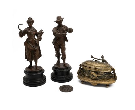 After Jules Moigniez, a gilt brass velvet lined jewellery box, oval form, decorated in relief with a hunting scene, the finia
