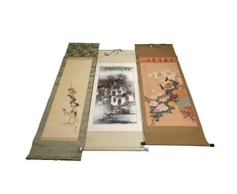 A group of three oriental paintings, to include: a Chinese traditional ink painting hanging scroll with a b/w porcelain end, 