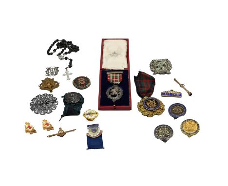 Group of Scottish Clan badges and others. Includes boxed Sterling silver 'The Caledonian Society of London' medal, 'Scottish 
