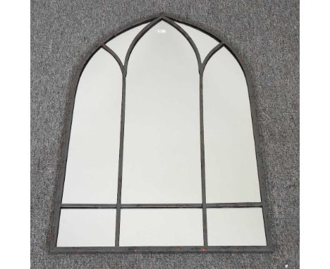 A small arched garden mirror, 80 x 49cm